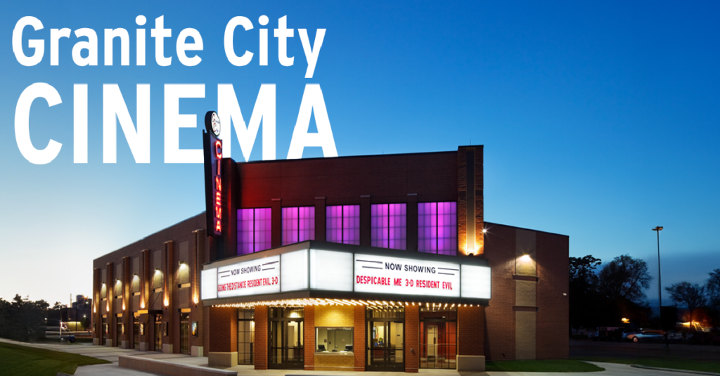 Stylish retro movie theater glowing in the evening light with the words Granite City Cinema floating above it