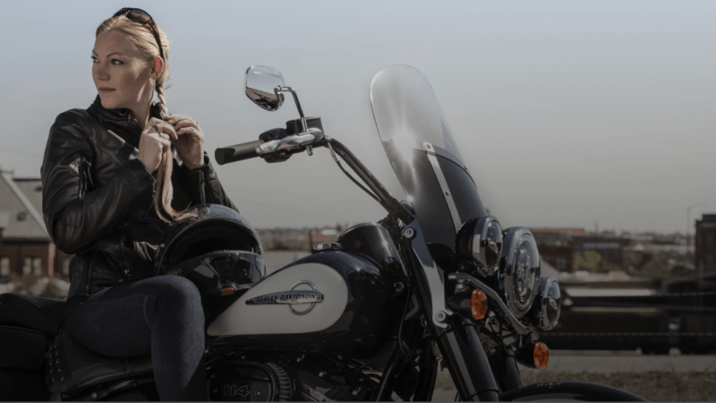 woman on harley davidson motorcycle