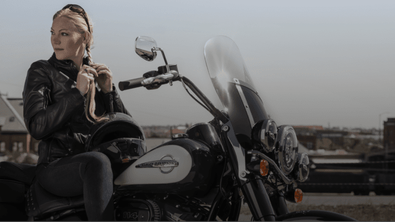 woman on harley davidson motorcycle