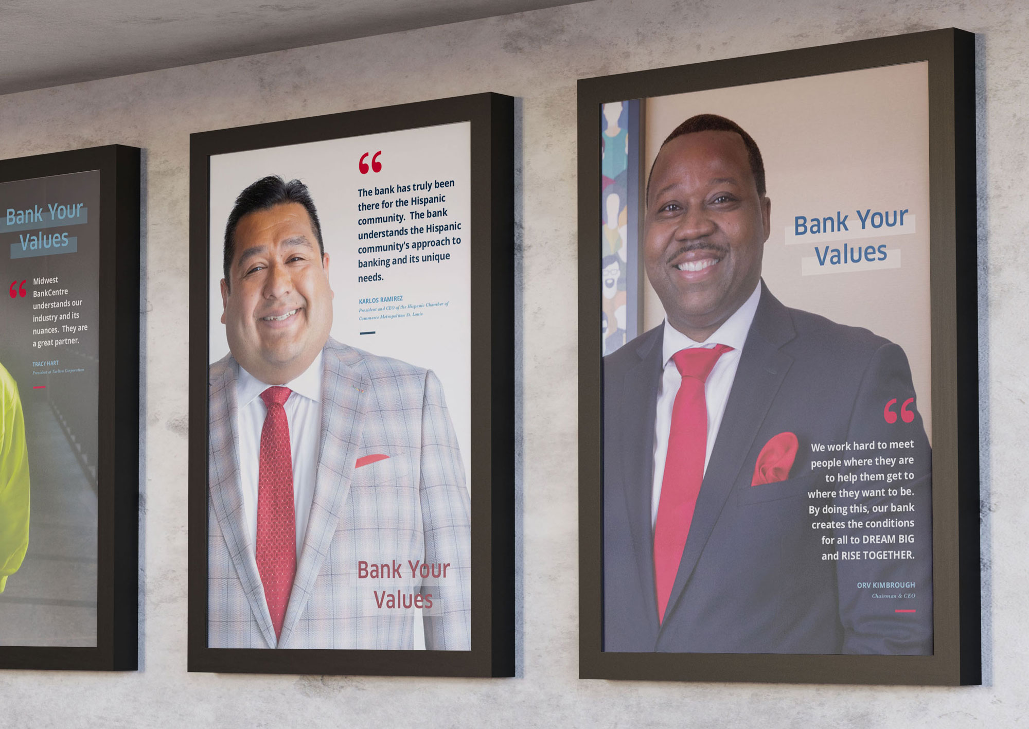 Posters of featured employees on a wall