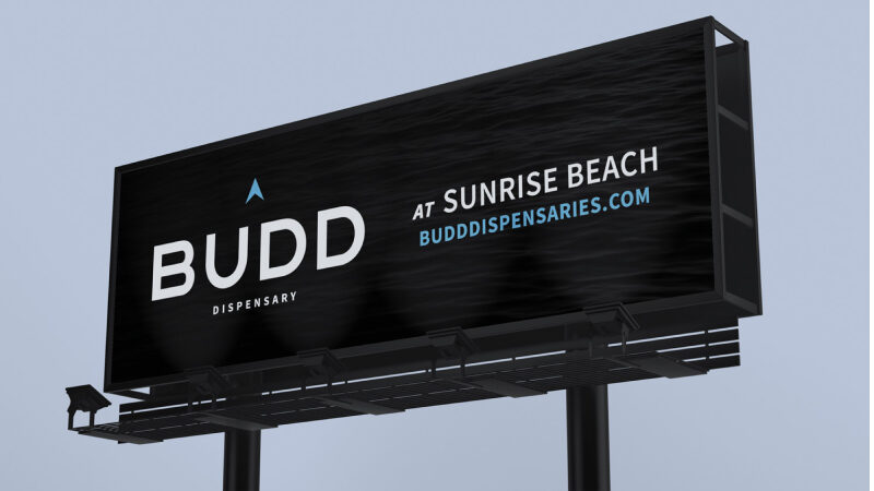 budd dispensary advertising billboard with a blue sky