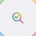 Minimalist graphic of a magnifying glass with a checkmark inside, surrounded by a circular gradient of rainbow colors symbolizing search and validation.