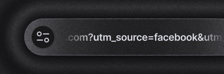 Close-up of a browser address bar showing URL parameters like “utm_source=facebook” for tracking marketing sources.