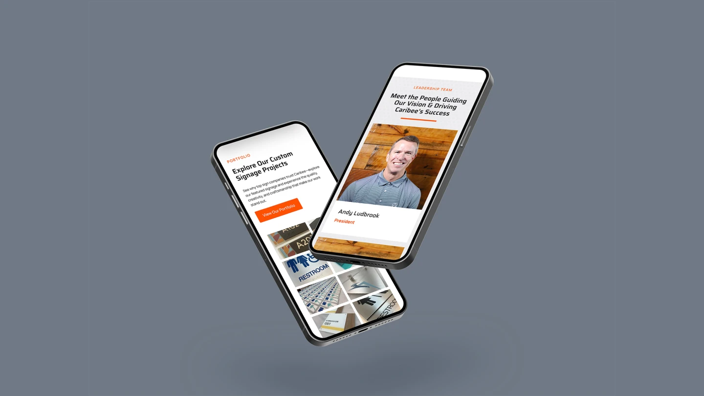 Two smartphones display websites on a gray background. One shows a smiling person above text. The other shows custom signage projects.