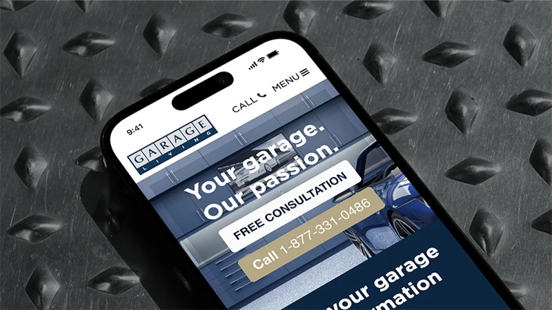 Smartphone displaying a garage service website on a diamond plate background. Text reads, "Your garage. Our passion. Free consultation." Professional tone.