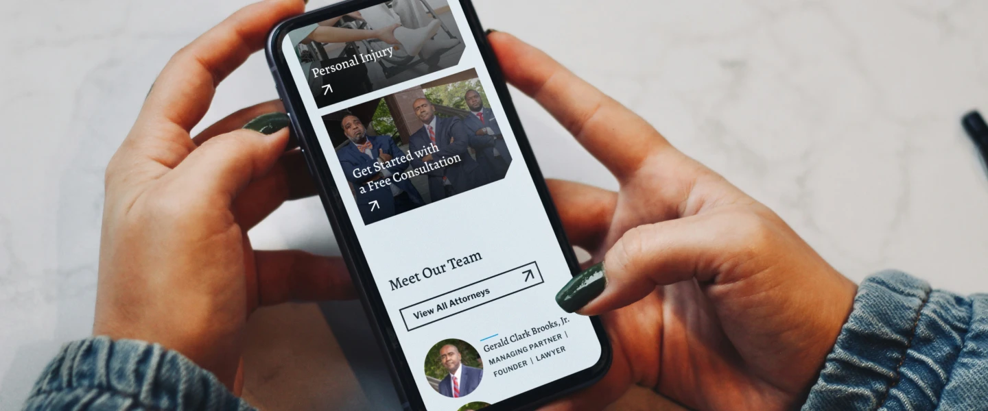 Mobile view of Serious Injury Law Group website showing personal injury services, free consultation call to action, and attorney listings