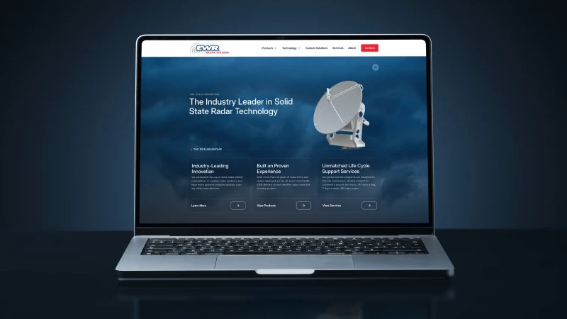 EWR Radar Systems website homepage displayed on a laptop, highlighting solid state radar technology, innovation, and support services.