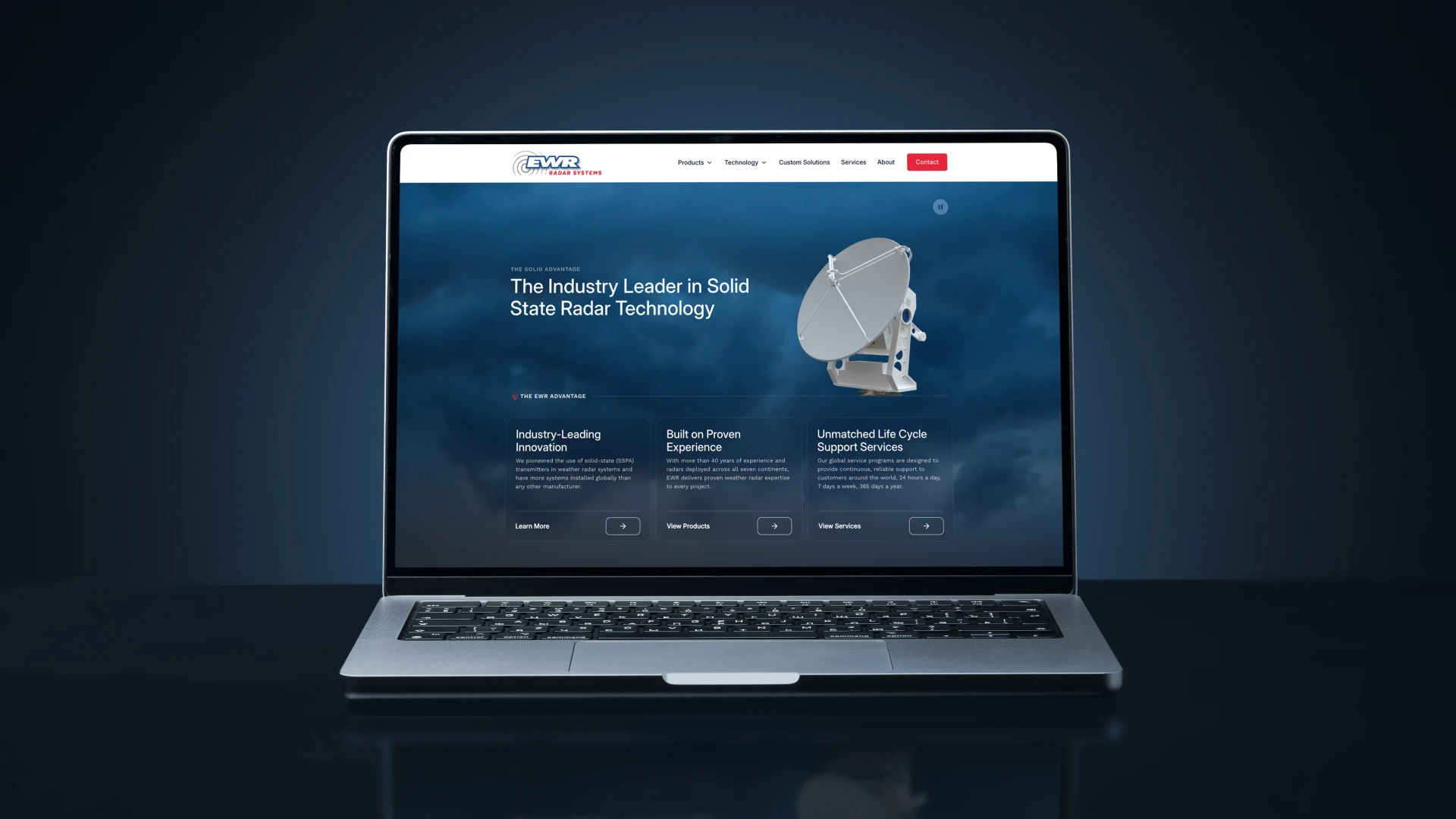 EWR Radar Systems website homepage displayed on a laptop, highlighting solid state radar technology, innovation, and support services.